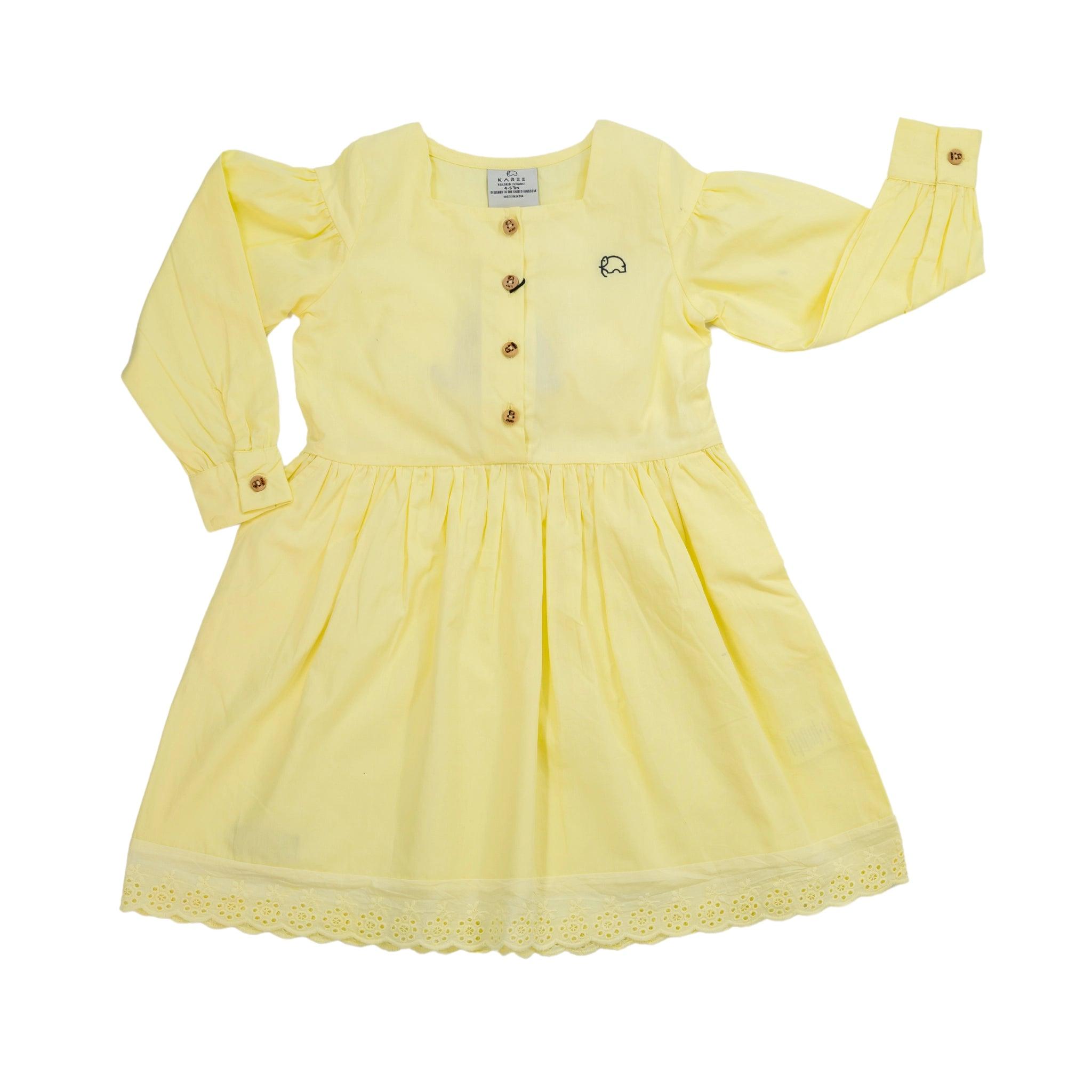 Yellow Karee children's cotton dress with long puff sleeves, button details, and lace trim, displayed on a white background.