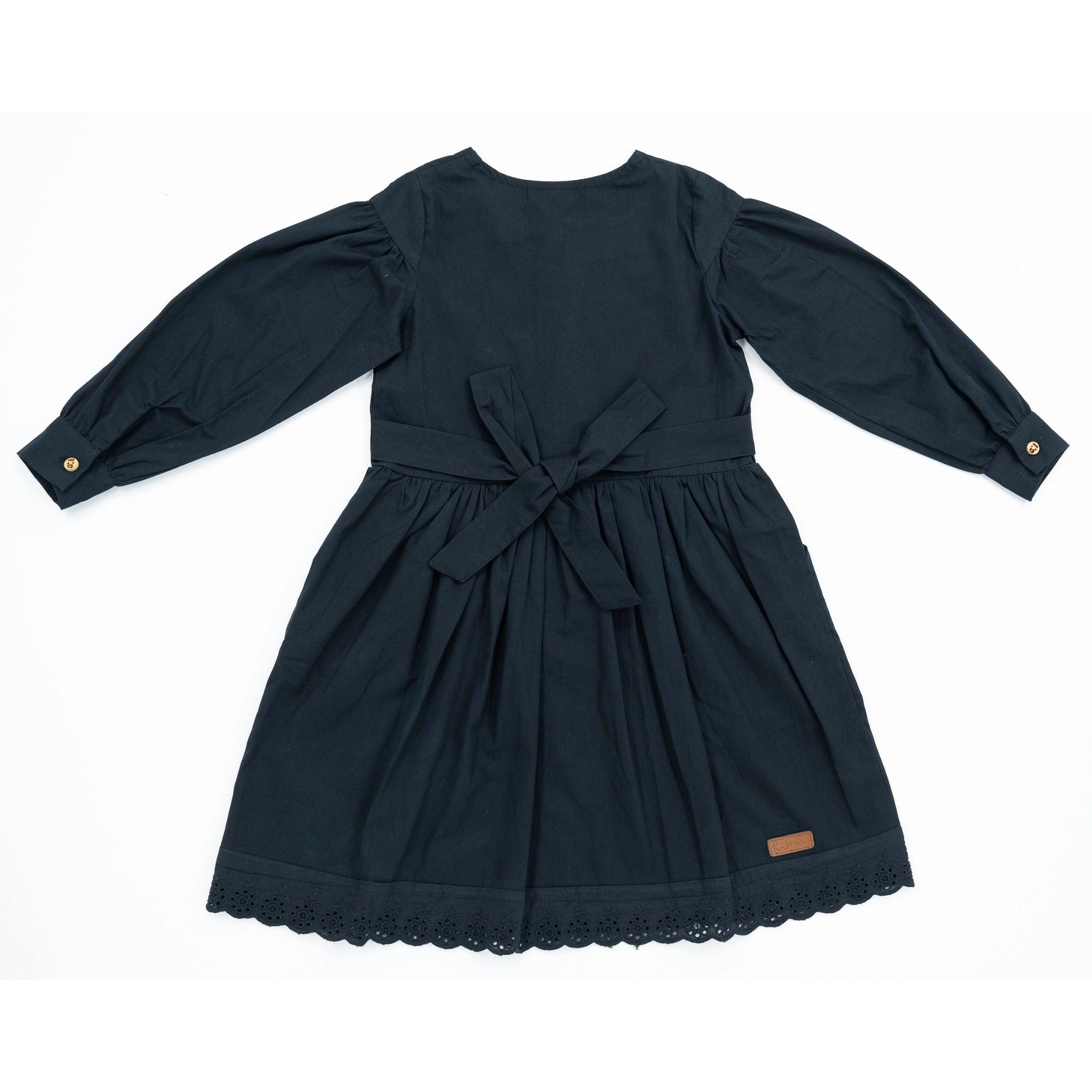 Black long-sleeve dress with a waist tie and lace trim at the hem, featuring long puff sleeves, against a white background - Karee Black Long Puff Sleeve Cotton Dress.