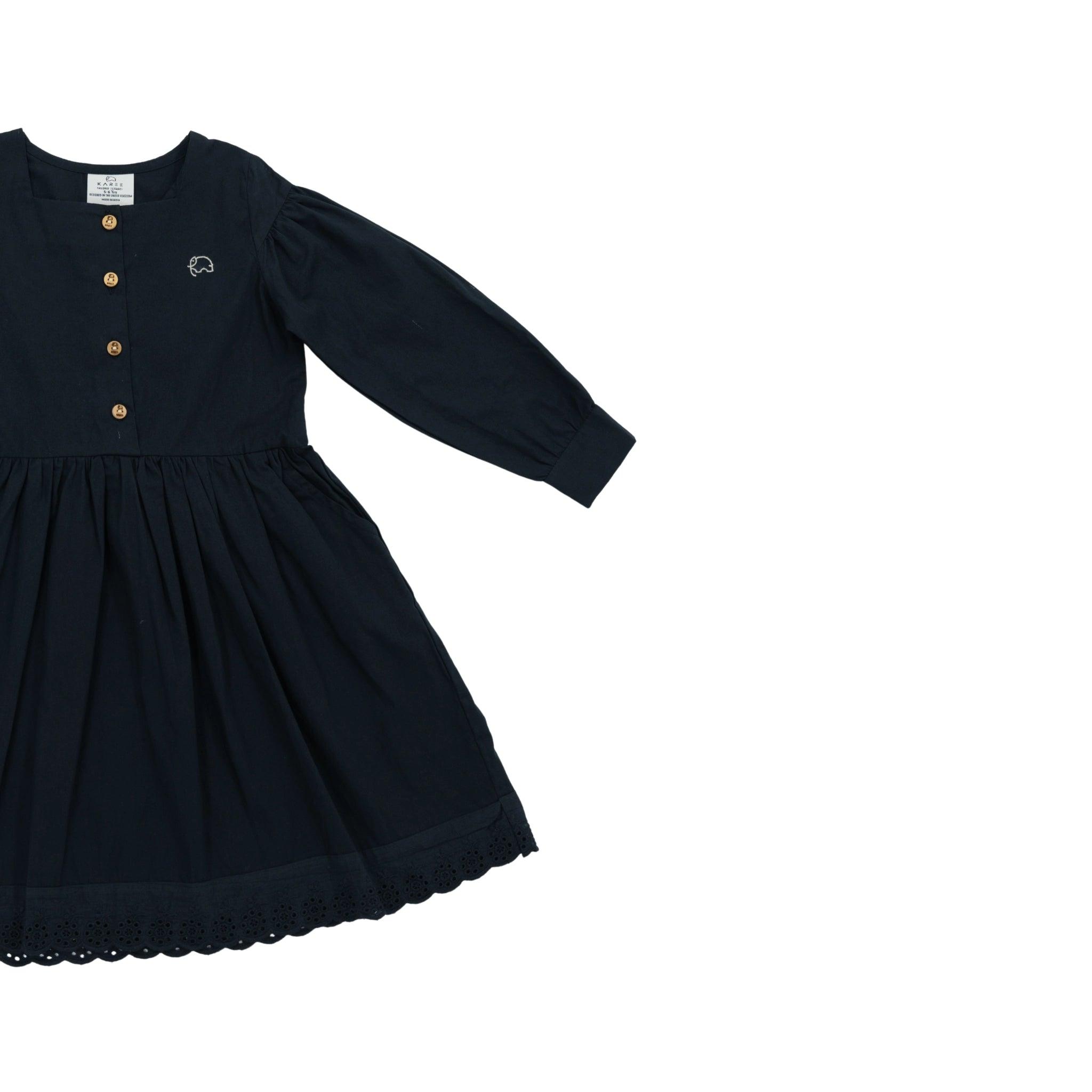 Dark blue toddler dress with long puff sleeves, buttoned front, and lace trim, isolated on a white background. 
Product Name: Black Long Puff Sleeve Cotton Dress 
Brand Name: Karee