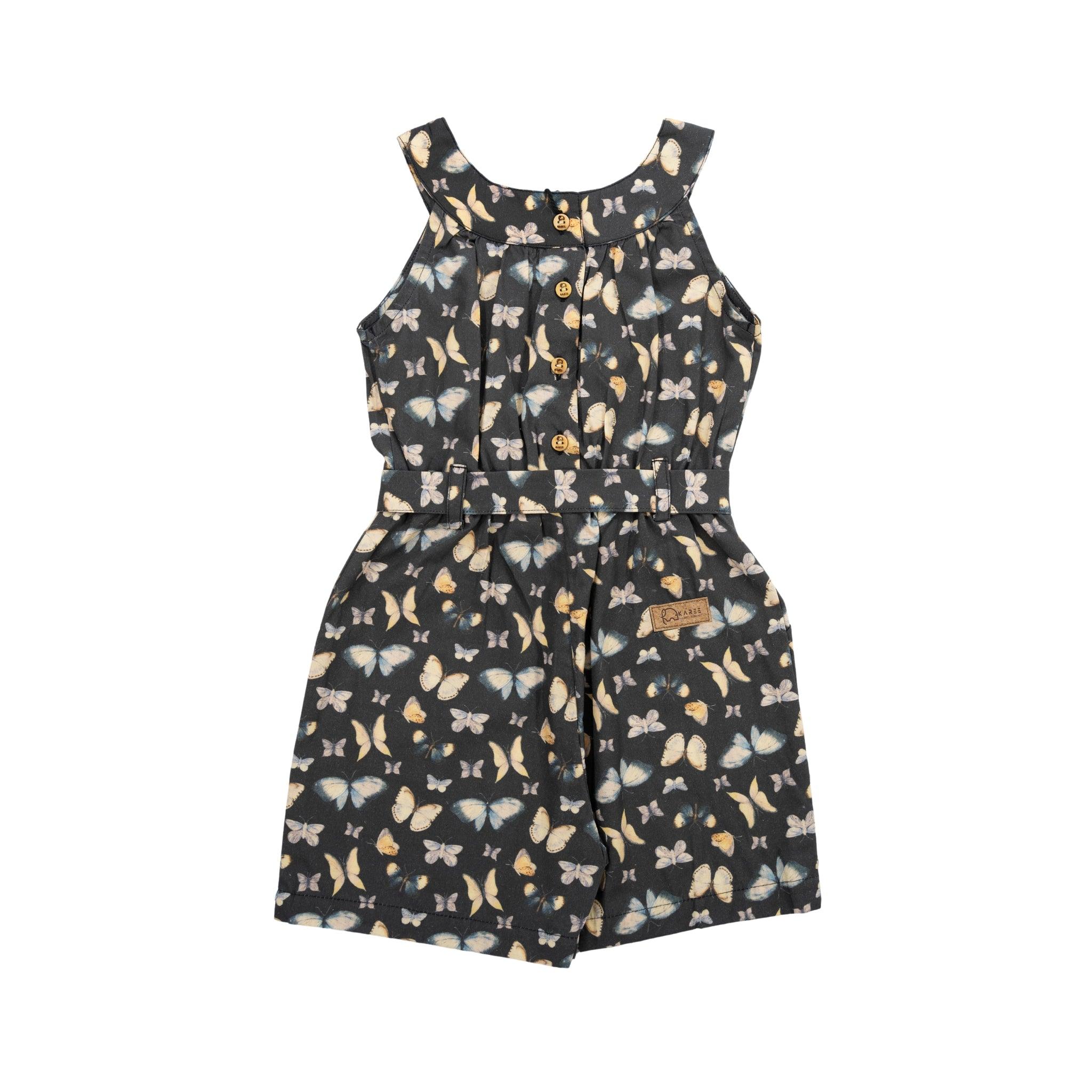 Sleeveless Pirate Black Adventure-ready Cotton Play Suit with a floral pattern and front button details, displayed against a white background by Karee.