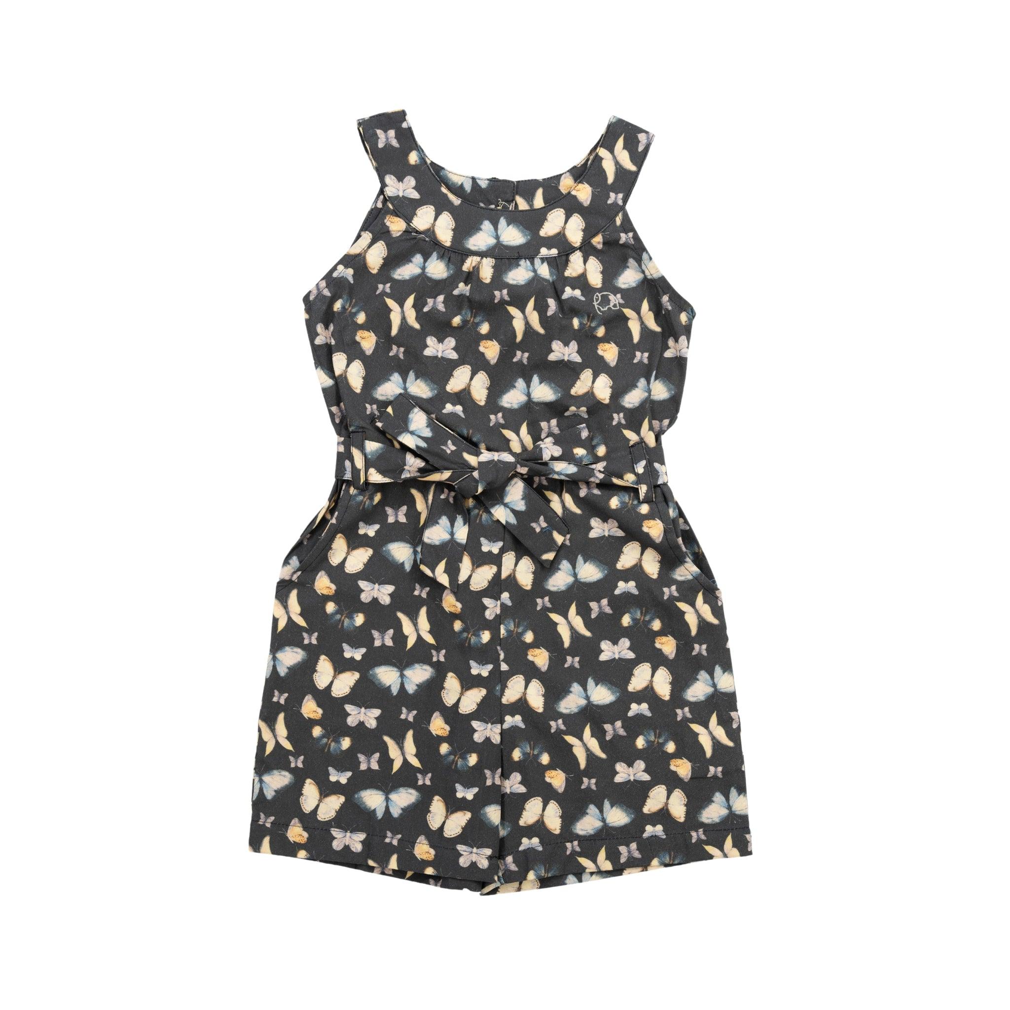 A sleeveless Pirate Black Adventure-ready Cotton Play Suit with a floral pattern and a waist belt, displayed against a white background by Karee.
