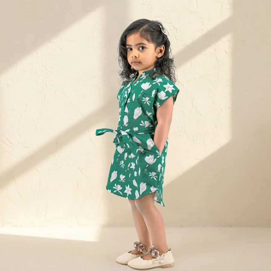 The Floral Shirt Dress in Green magnolia, worn by a child